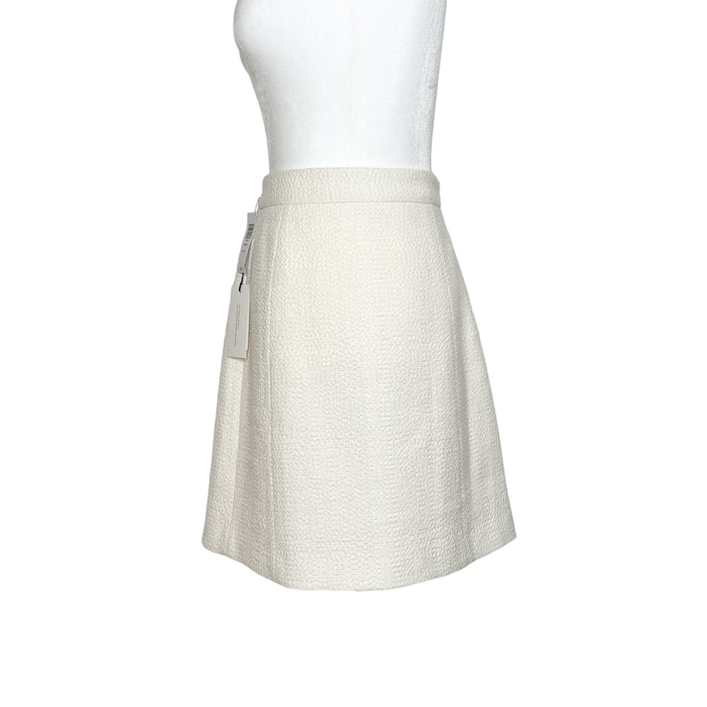 🌟NWT🌟Babaton A-line mini skirt. Size 8. Color white.